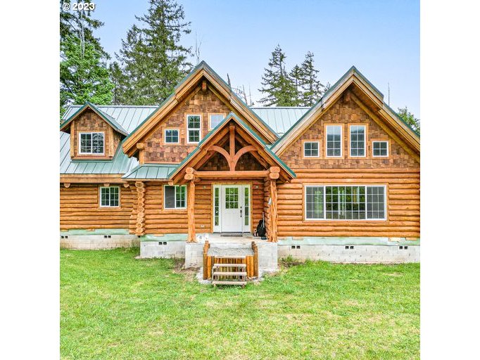 72717 London Road Cottage Grove, OR 97424 - Photo 1 of 41 a front view of a house with a yard and porch