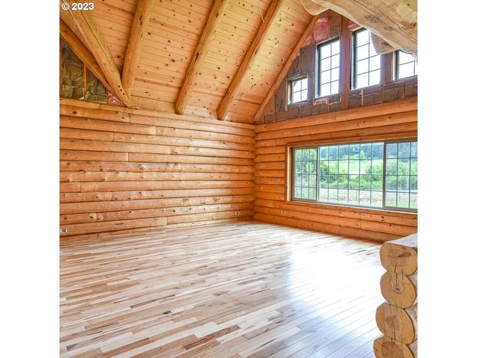 72717 London Road Cottage Grove, OR 97424 - Photo 14 of 41 a view of empty room with wooden floor and fan