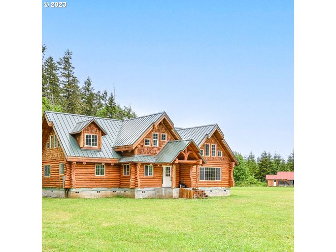 72717 London Road Cottage Grove, OR 97424 - Photo 2 of 41 a view of a house with a big yard and large trees