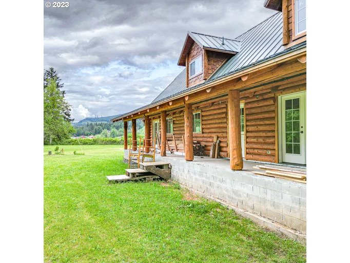 72717 London Road Cottage Grove, OR 97424 - Photo 4 of 41 a view of a house with backyard and porch
