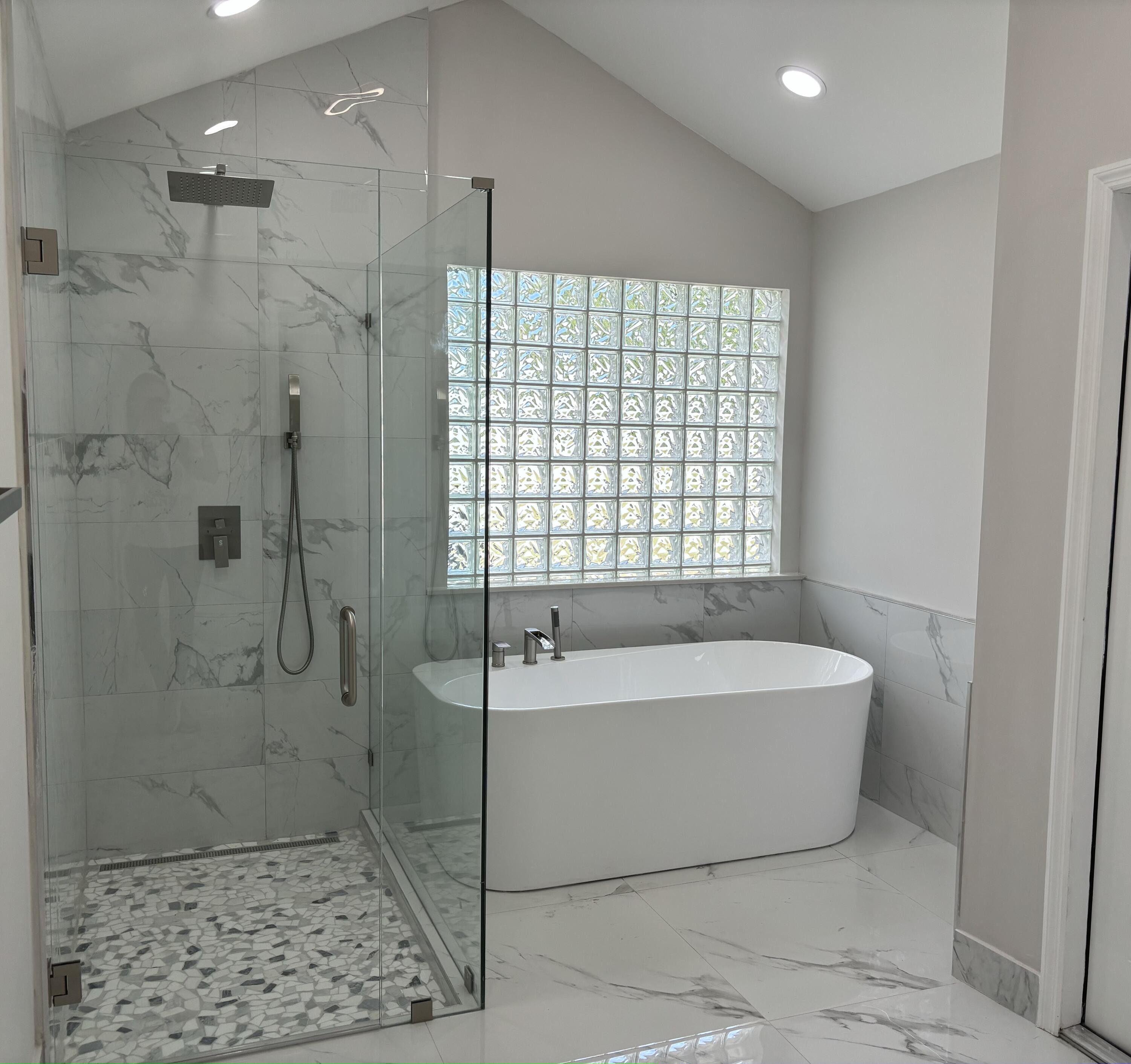 1341 West Royal Palm Road Boca Raton, FL 33486 - Photo 10 of 19 a bathroom with a bathtub and shower