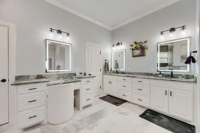 an aerial view of a houses with ocean view