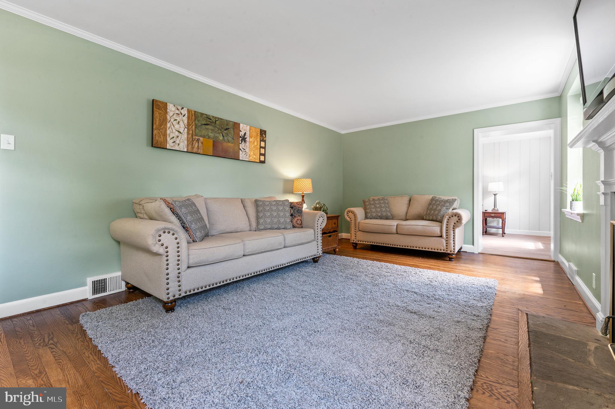 31 Whitemarsh Road Ardmore, PA 19003 - Photo 12 of 35 Living room looking into the family room