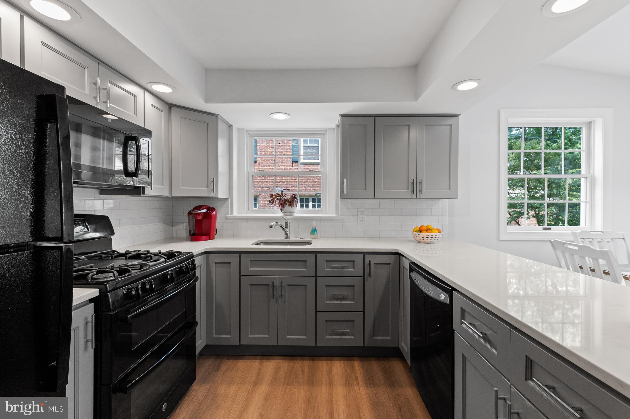 31 Whitemarsh Road Ardmore, PA 19003 - Photo 5 of 35 Gray kitchen cabinets with white quartz counters