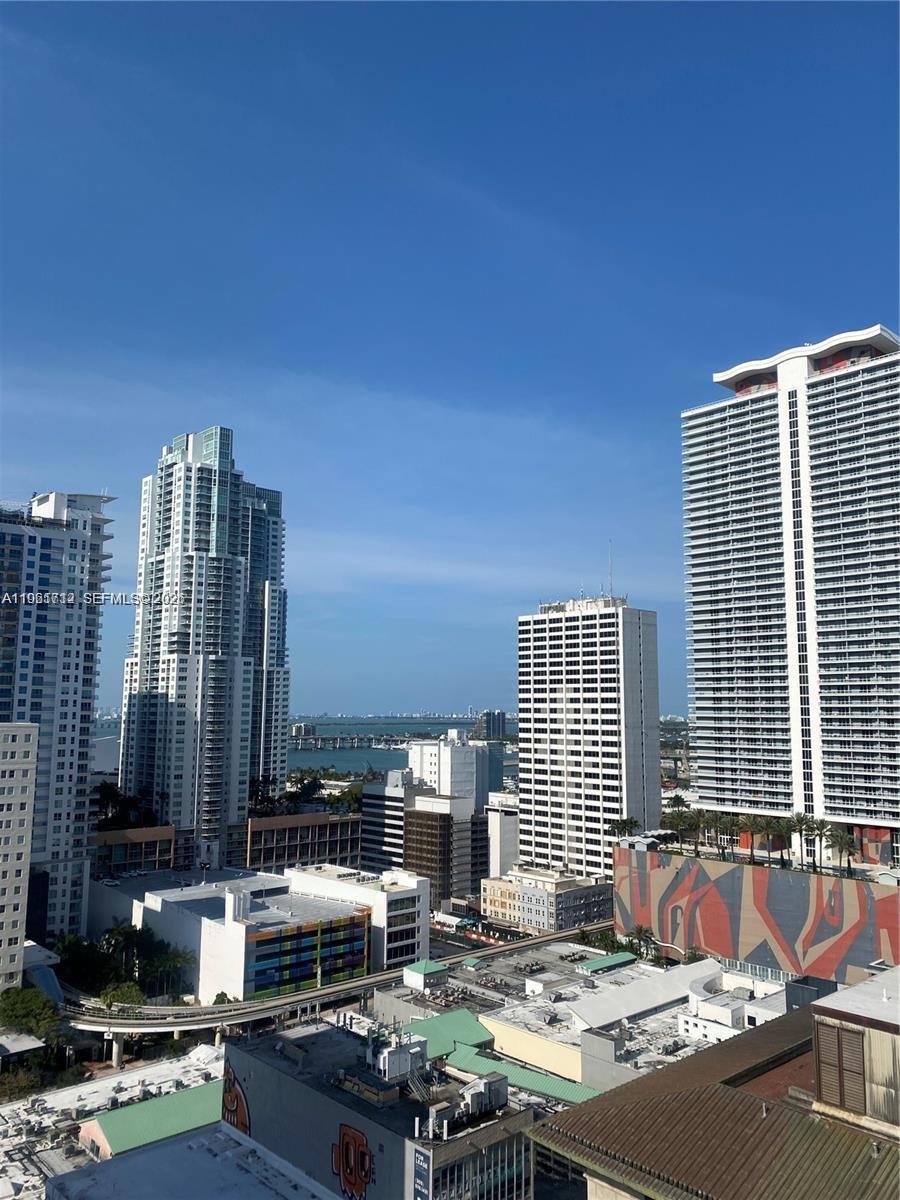151 Southeast 1st Street, Unit 2104 Miami, FL 33131 - Photo 26 of 29 a view of swimming pool with outdoor seating