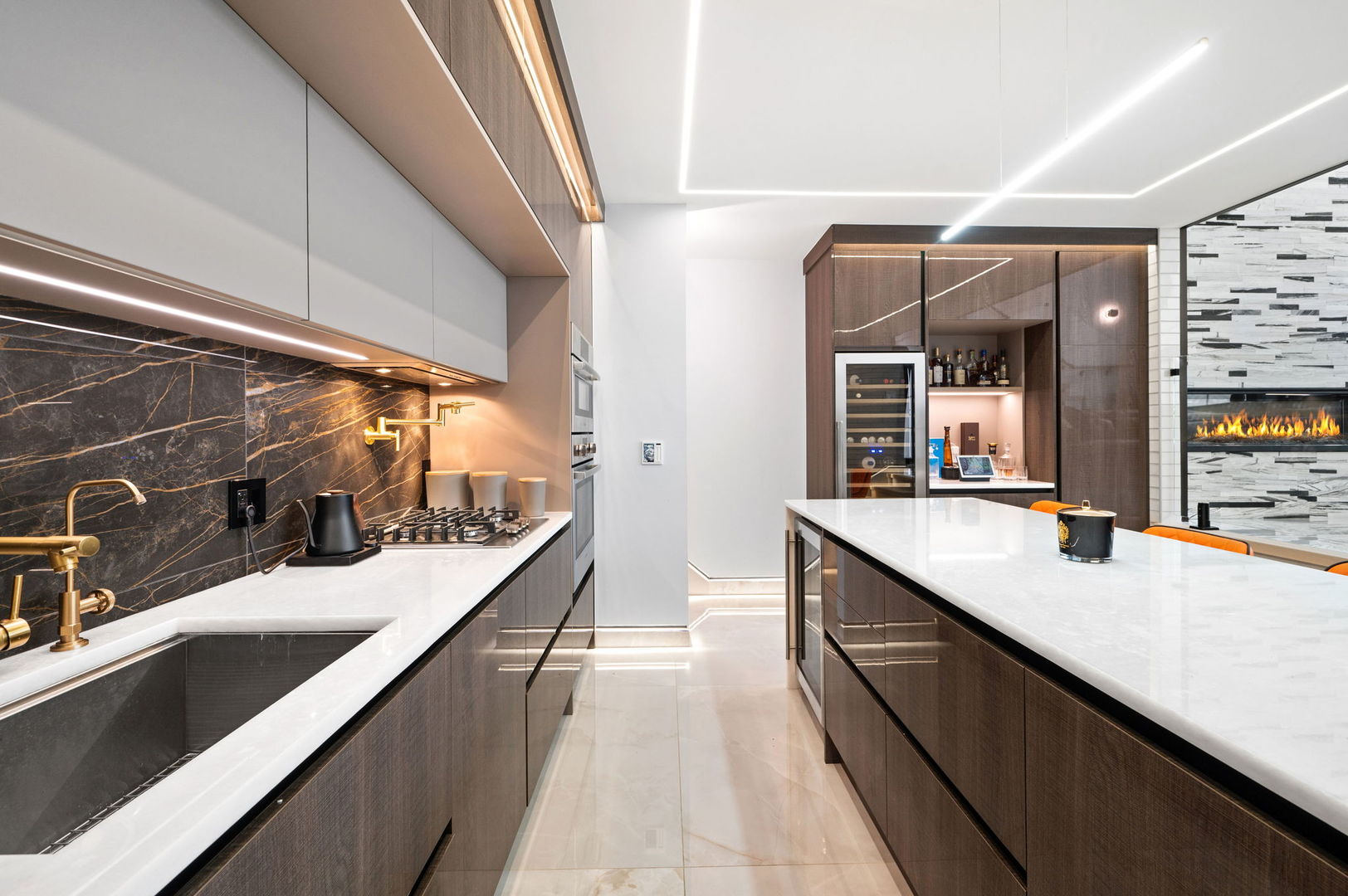 3024 West Irving Park Road, Unit 1S Chicago, IL 60618 - Photo 10 of 44 a large kitchen with kitchen island a sink and wooden floor