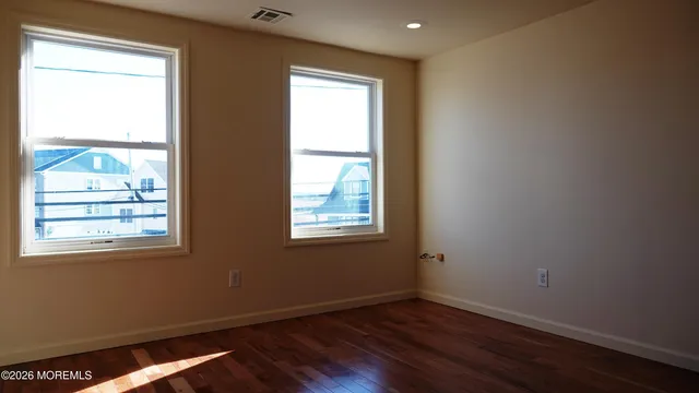 a kitchen with a refrigerator sink and microwave