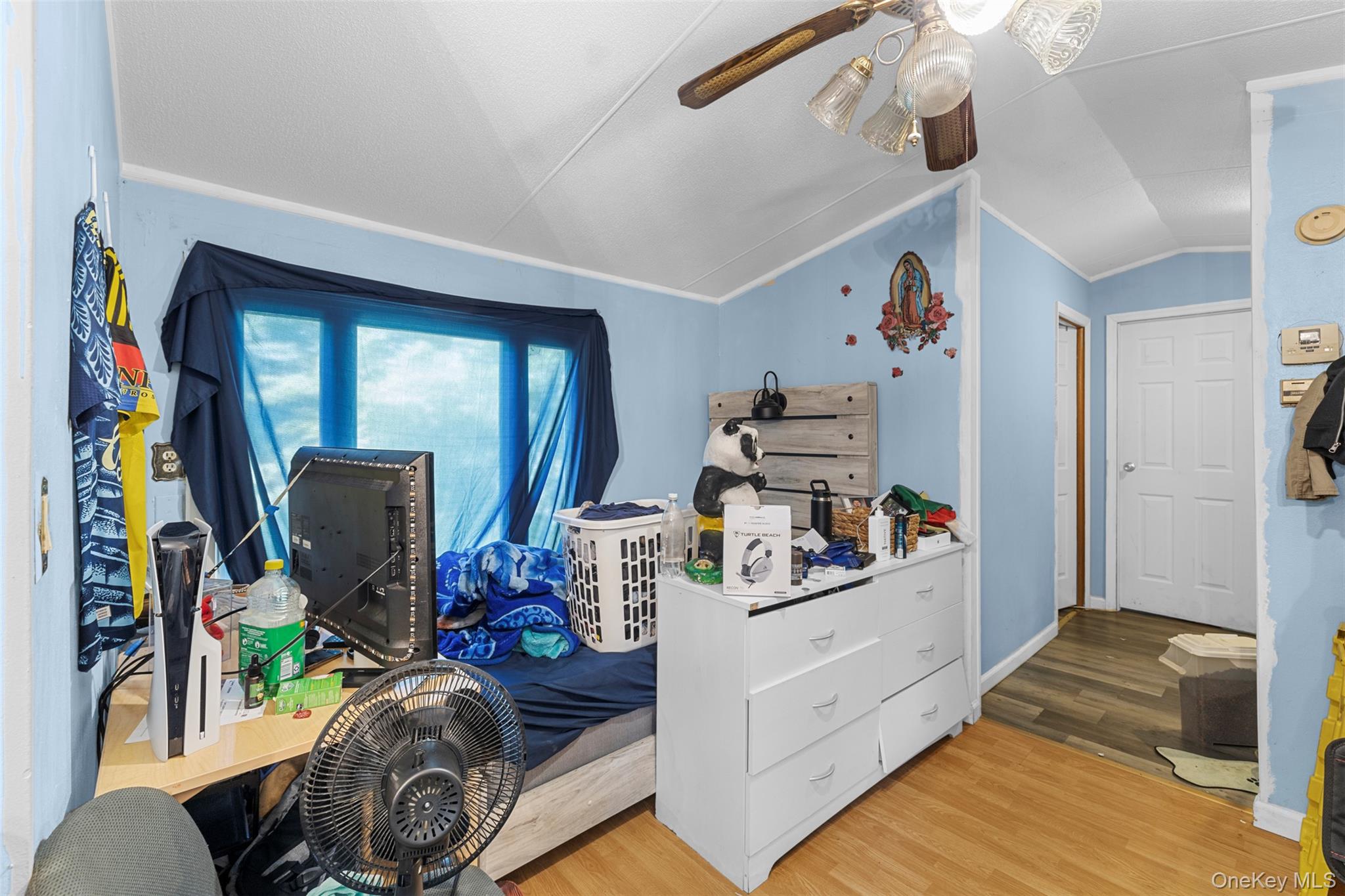 172 Orange Lake Road Walden, NY 12586 - Photo 15 of 22 a view of a workspace with furniture and a flat screen tv