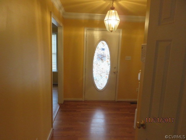 15812 Sandwave Road Chester, VA 23831 - Photo 17 of 45 a view of a livingroom with wooden floor and a large window