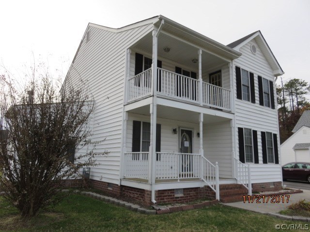 15812 Sandwave Road Chester, VA 23831 - Photo 3 of 45 a view of a house with a yard