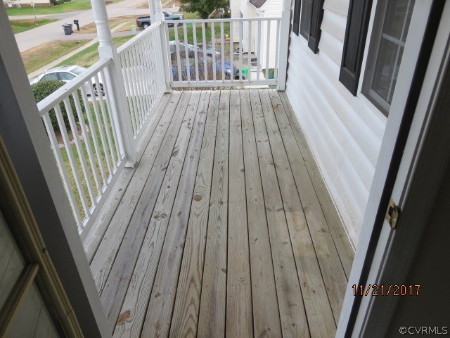 15812 Sandwave Road Chester, VA 23831 - Photo 33 of 45 a view of balcony with wooden floor