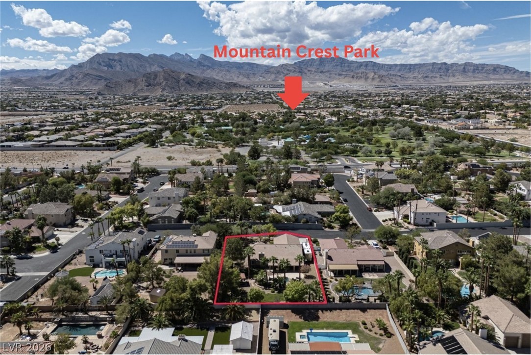 4670 Los Rancheros Avenue Las Vegas, NV 89129 - Photo 8 of 57 Dramatic mountain backdrops frame this neighborhood property situated near a local park.