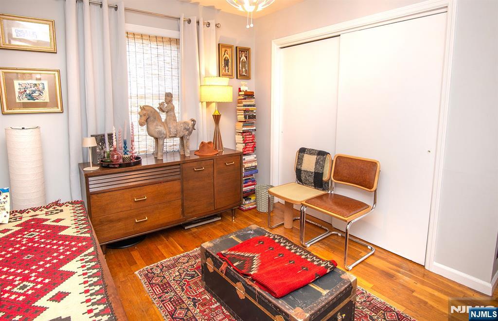 96 Porter Avenue Bergenfield, NJ 07621 - Photo 13 of 18 a room with furniture and window