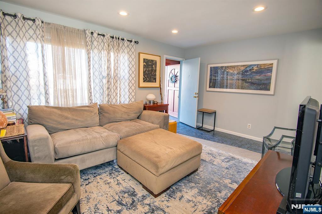 96 Porter Avenue Bergenfield, NJ 07621 - Photo 4 of 18 a living room with furniture and a wooden floor