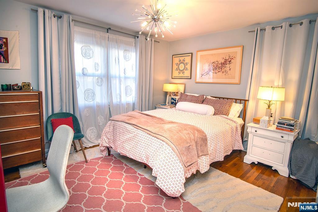 96 Porter Avenue Bergenfield, NJ 07621 - Photo 9 of 18 a bedroom with bed and a window