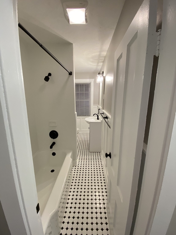 91 Main, Unit 2W Easton, MA 02356 - Photo 9 of 10 a bathroom with a shower