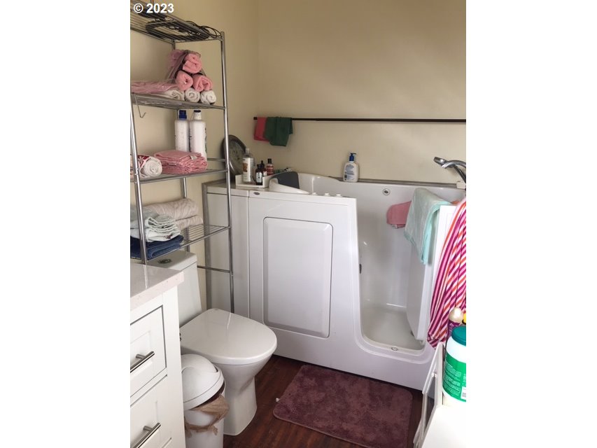 210 Quail Drive Spray, OR 97874 - Photo 6 of 6 a bathroom with a sink toilet and a mirror