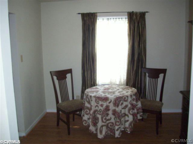 2925 Shiloh Church Road Midlothian, VA 23112 - Photo 3 of 11 a bedroom with a bed and a window