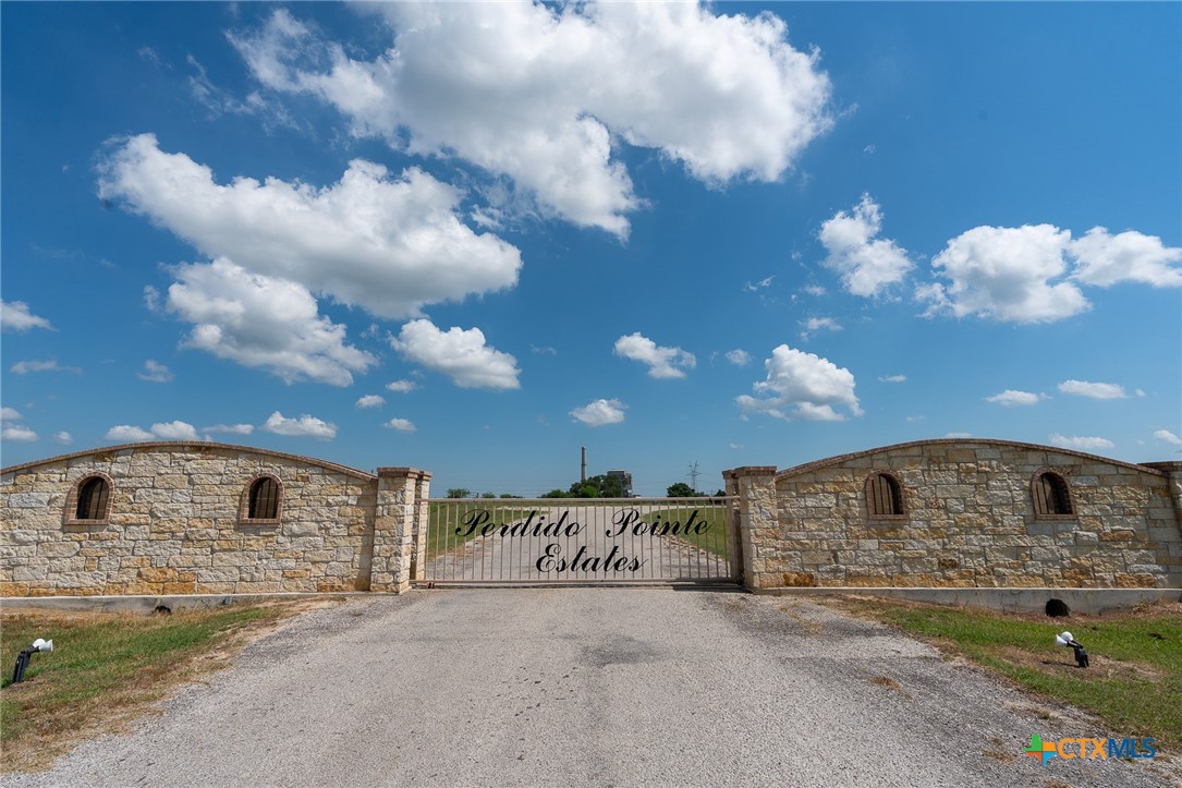 Lot 49 Perdido Pointe Estates Victoria, TX 77905 - Photo 14 of 14 a front view of a house with a yard