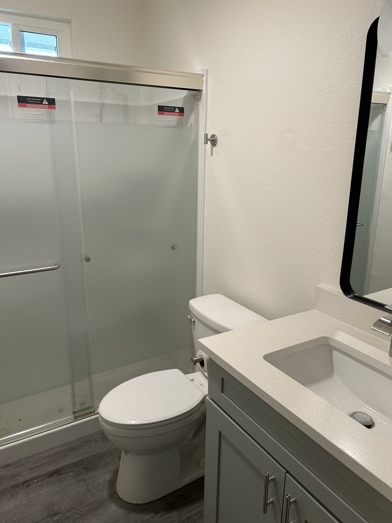 1507 Cinnamon Path, Unit A Austin, TX 78704 - Photo 7 of 8 a bathroom with a sink and toilet