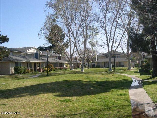 564 Spring Road, Unit 80 Moorpark, CA 93021 - Photo 1 of 1 a view of a big yard in front of a building