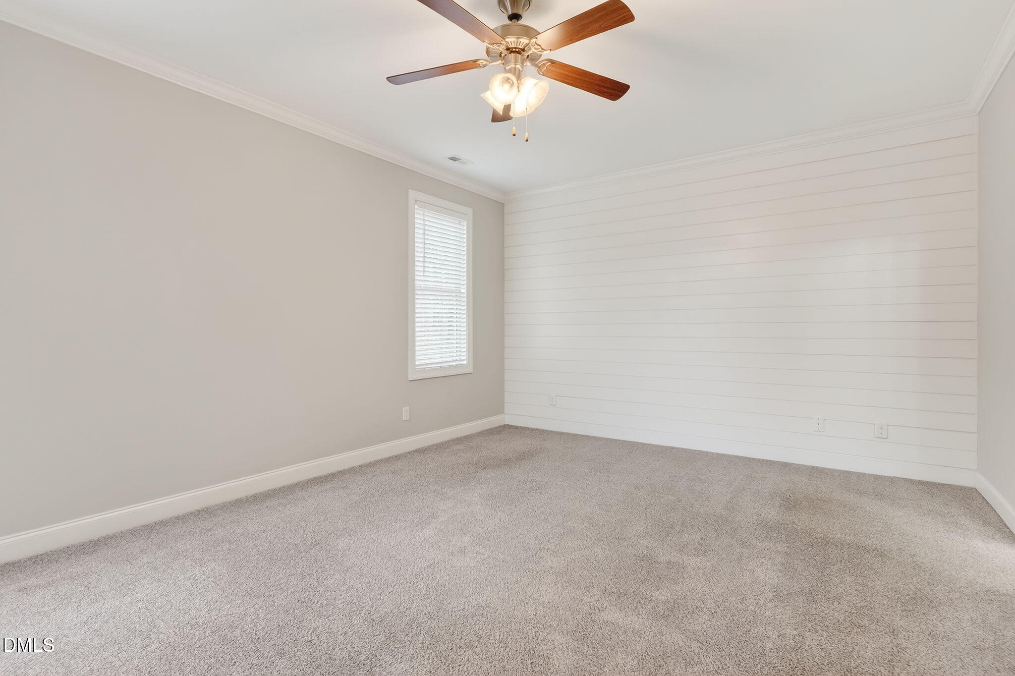 5441 Fantasy Moth Drive Garner, NC 27529 - Photo 17 of 55 an empty room with windows and fan