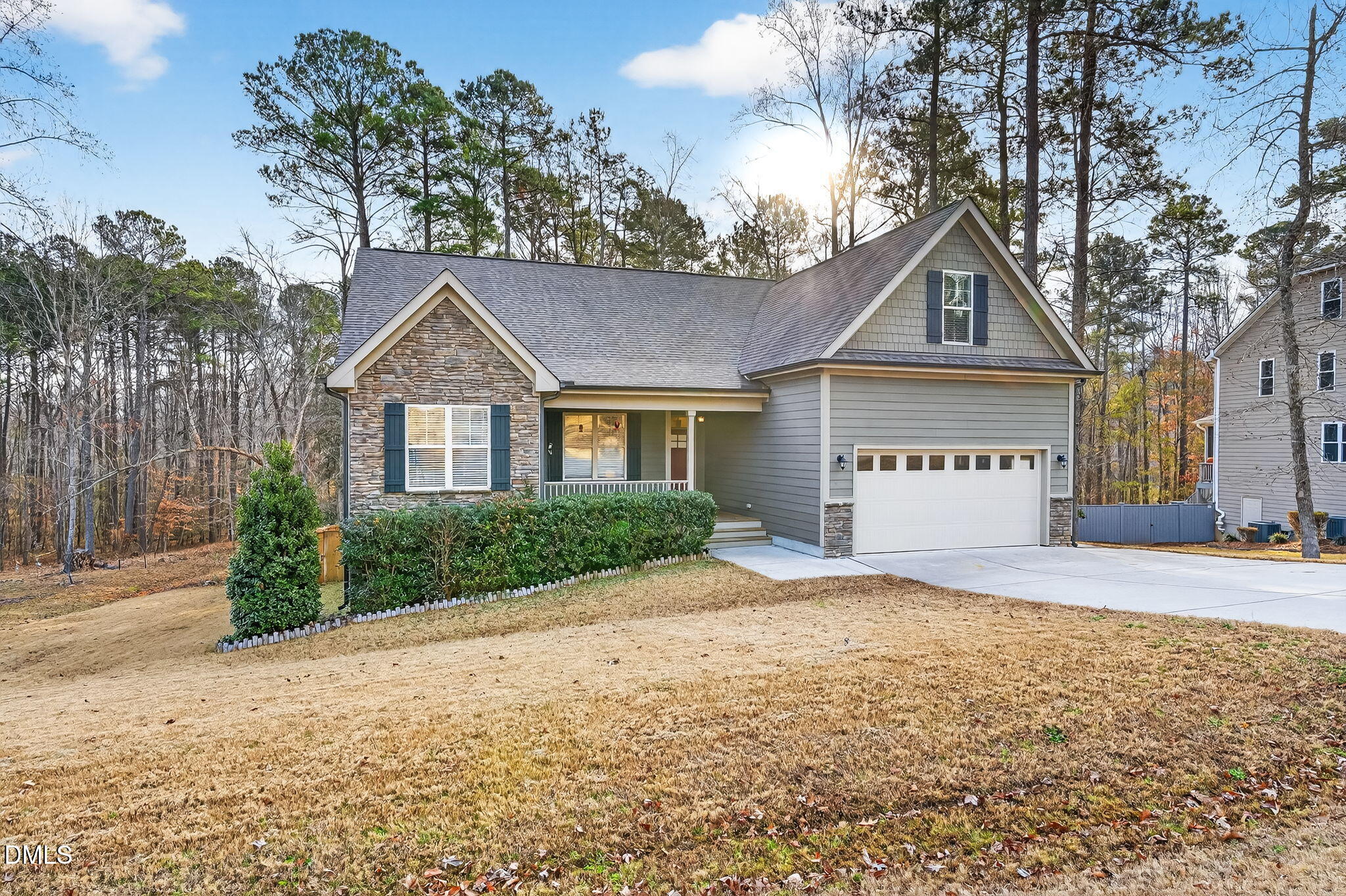 5441 Fantasy Moth Drive Garner, NC 27529 - Photo 2 of 55 a front view of a house with a garden and yard