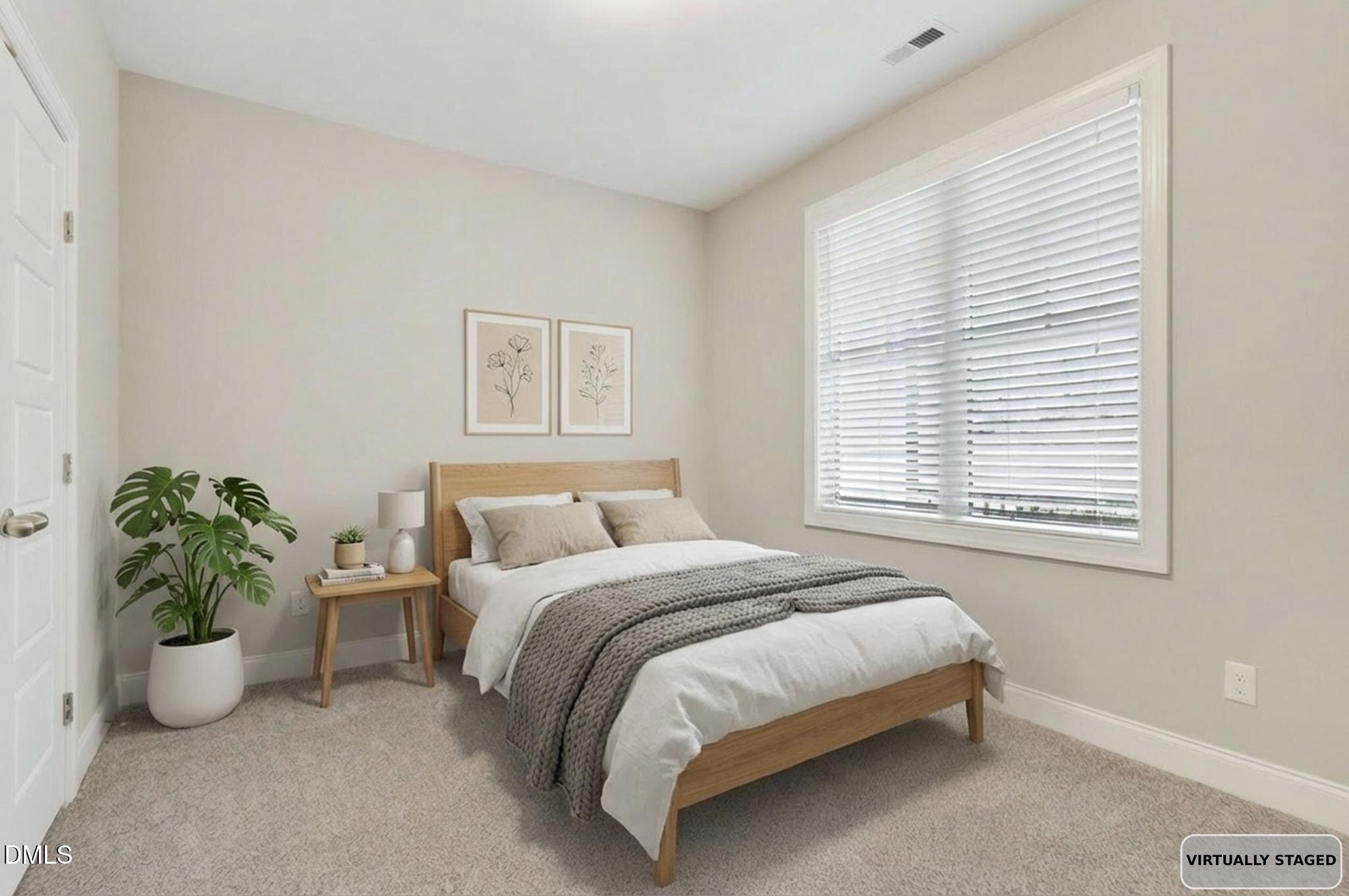 5441 Fantasy Moth Drive Garner, NC 27529 - Photo 23 of 55 a bedroom with a bed and a window