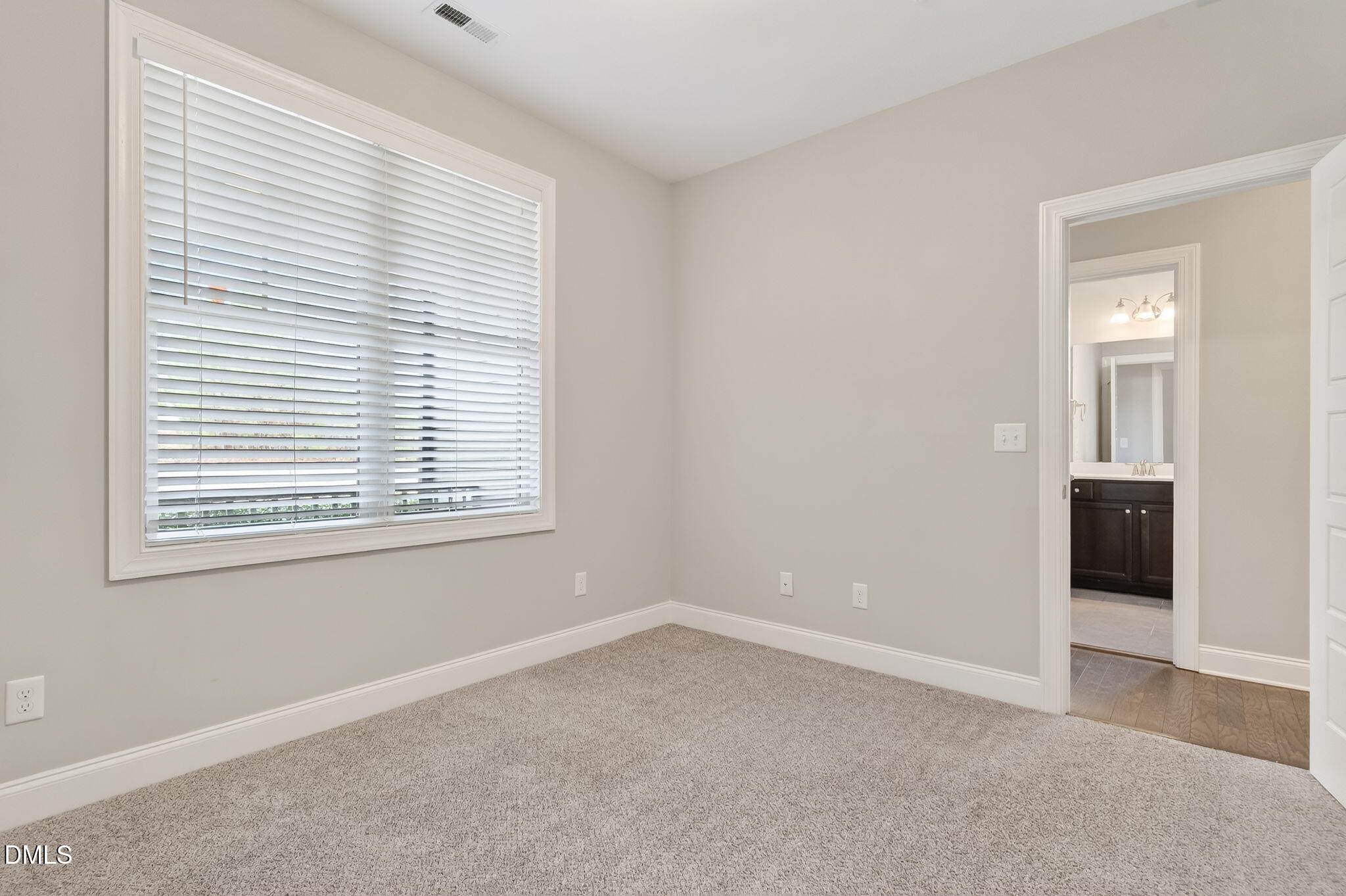 5441 Fantasy Moth Drive Garner, NC 27529 - Photo 26 of 55 an empty room with windows