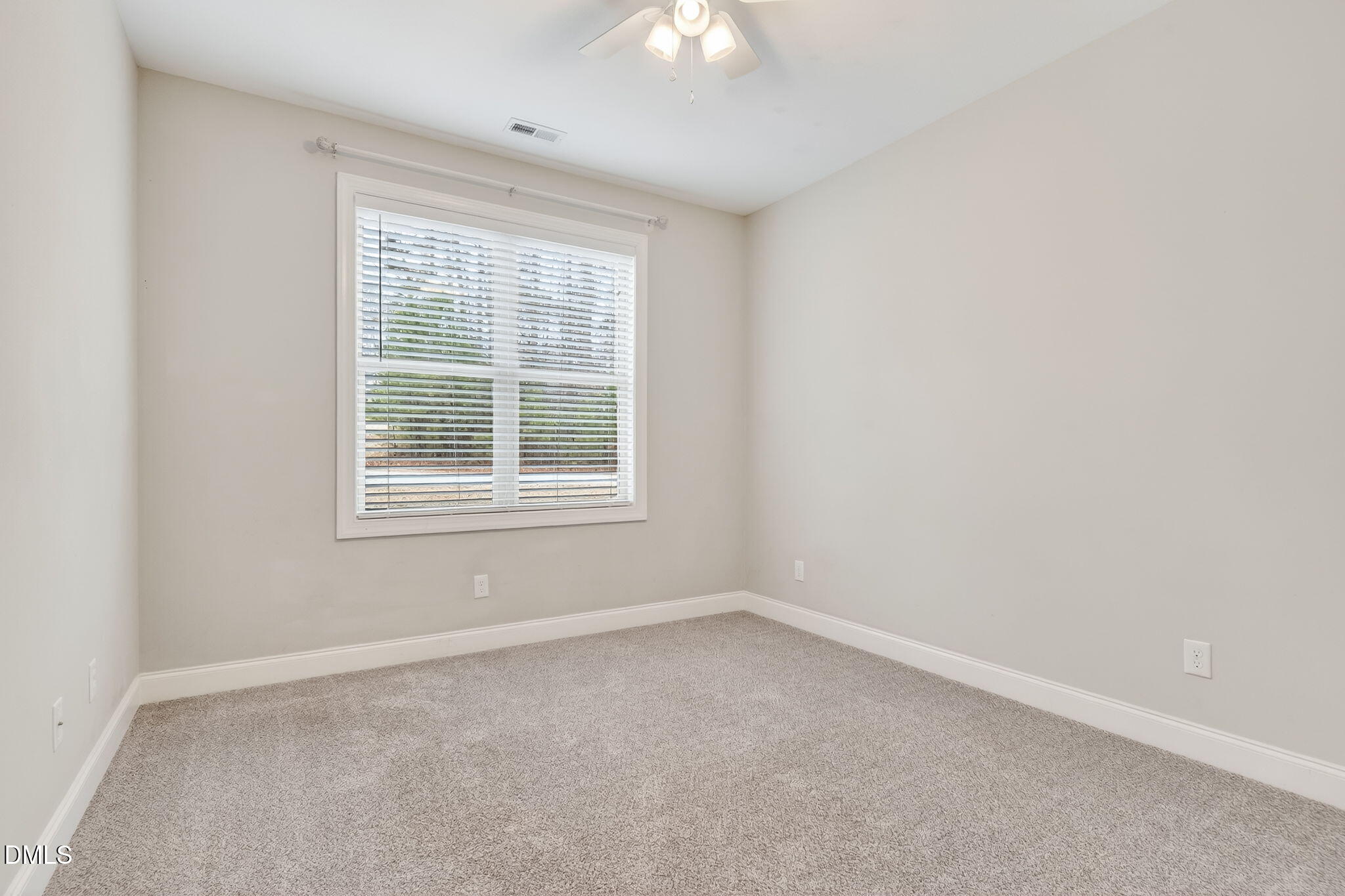 5441 Fantasy Moth Drive Garner, NC 27529 - Photo 28 of 55 an empty room with a window