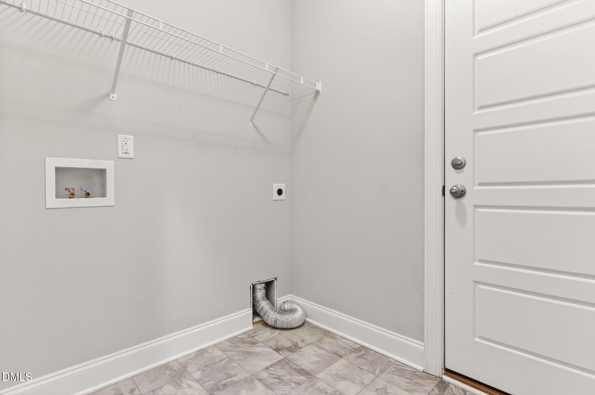 5441 Fantasy Moth Drive Garner, NC 27529 - Photo 32 of 55 a view of a room with racks on the wall