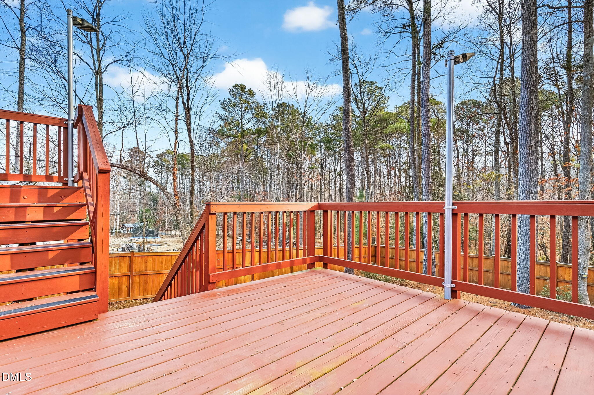 5441 Fantasy Moth Drive Garner, NC 27529 - Photo 46 of 55 a balcony with trees in front of it