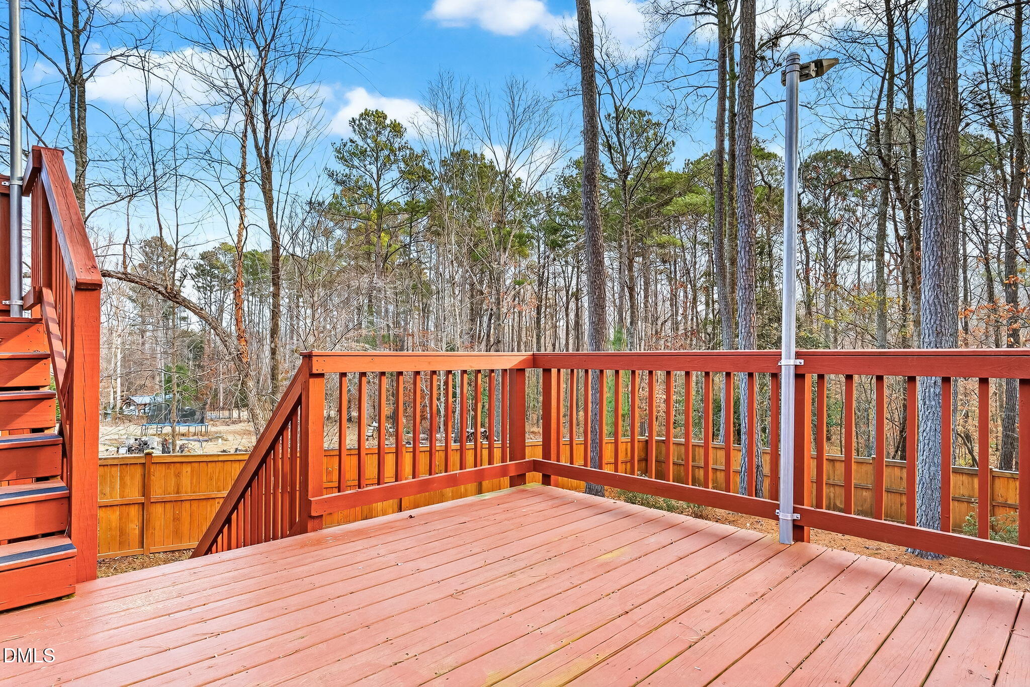 5441 Fantasy Moth Drive Garner, NC 27529 - Photo 46 of 55 a balcony with trees in front of it