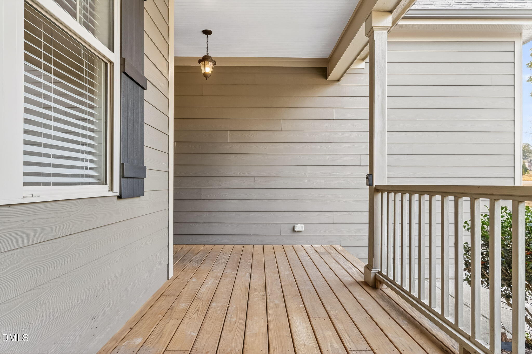 5441 Fantasy Moth Drive Garner, NC 27529 - Photo 5 of 55 a view of a balcony with wooden floor