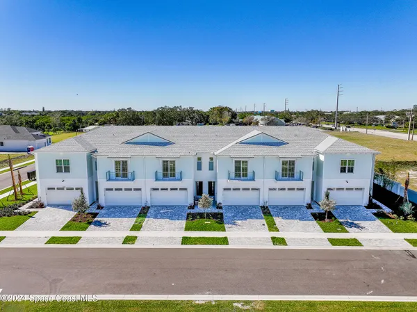 a view of house with outdoor space and patio