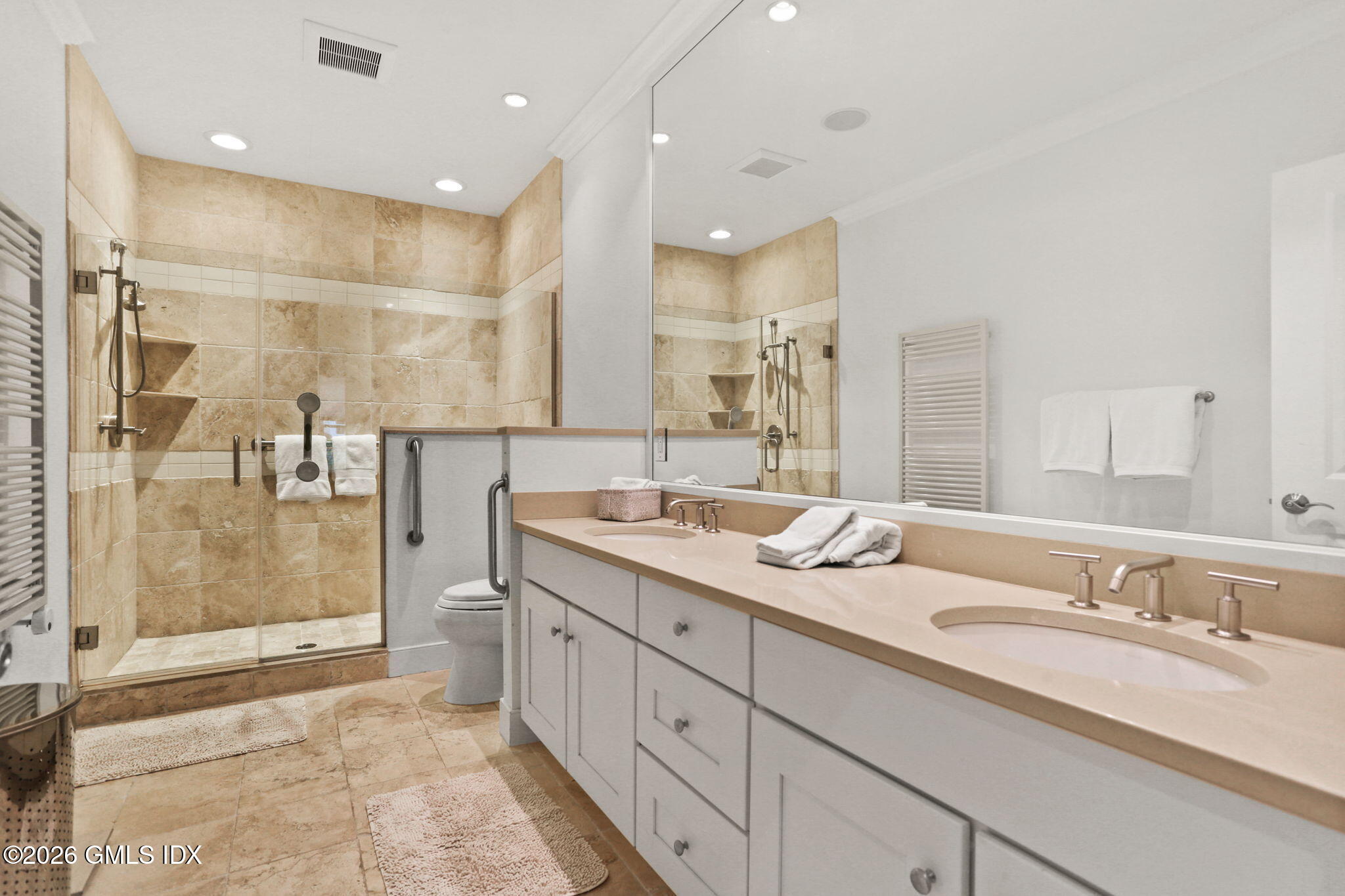 77 Havemeyer Lane, Unit 58 Stamford, CT 06902 - Photo 13 of 40 a bathroom with a granite countertop sink mirror and double