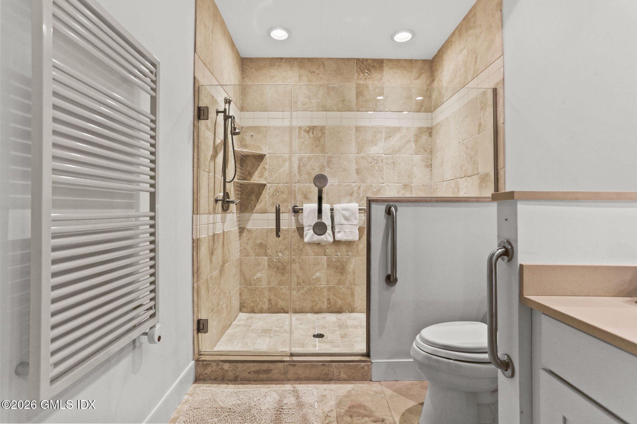 77 Havemeyer Lane, Unit 58 Stamford, CT 06902 - Photo 14 of 40 a bathroom with a shower a toilet and a sink