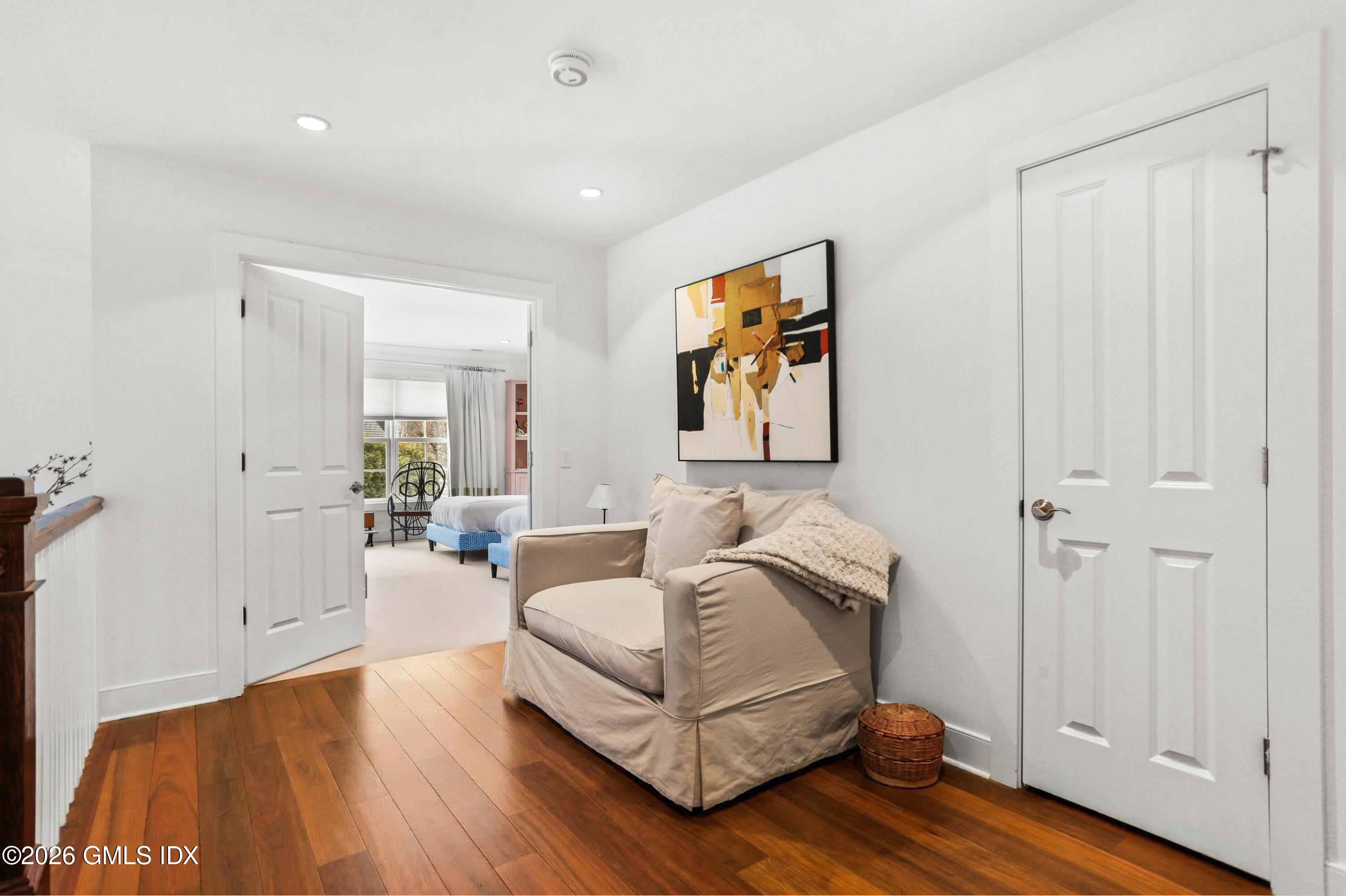 77 Havemeyer Lane, Unit 58 Stamford, CT 06902 - Photo 20 of 40 a living room with furniture and wooden floor