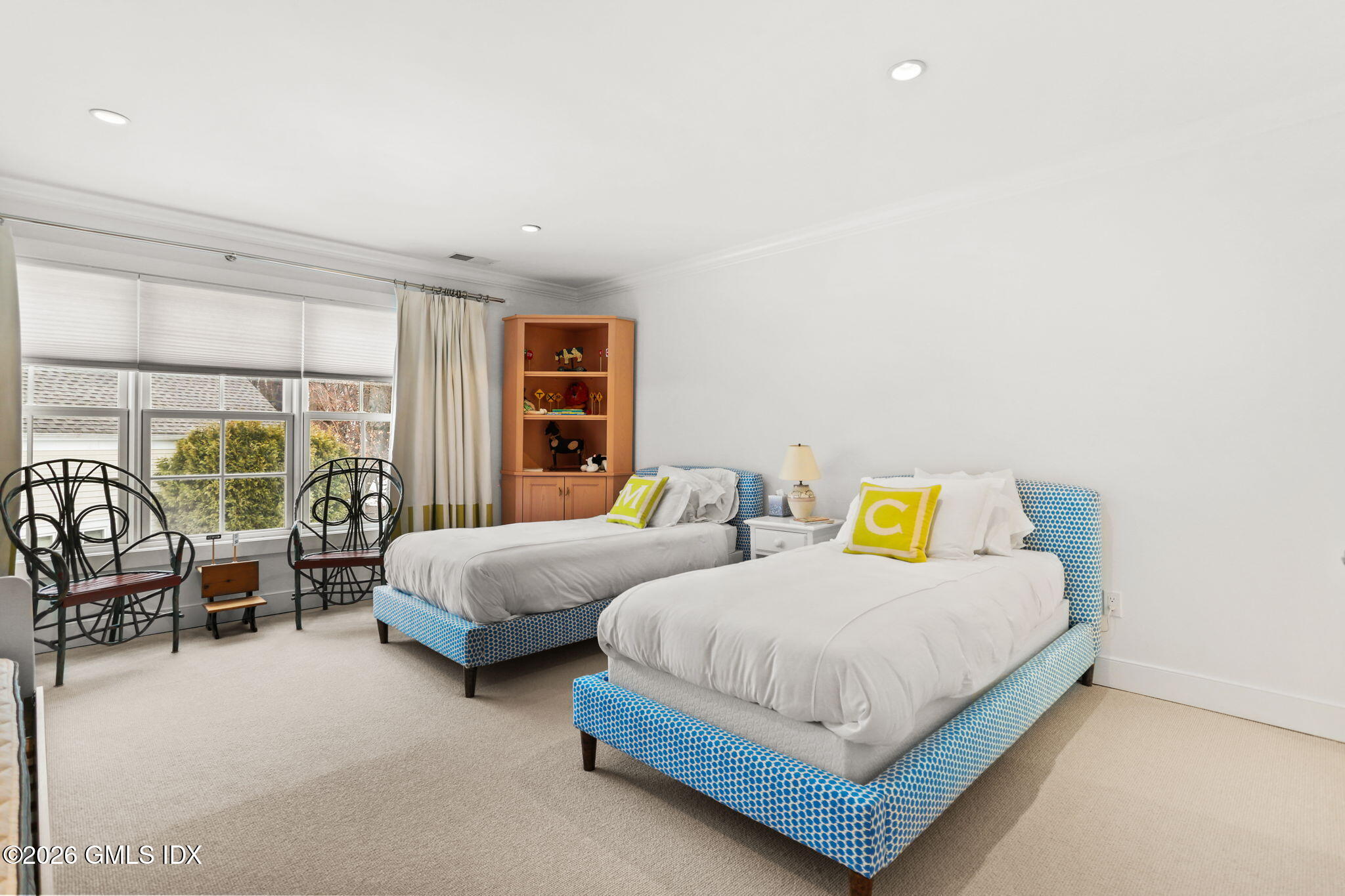 77 Havemeyer Lane, Unit 58 Stamford, CT 06902 - Photo 21 of 40 a bedroom with two beds and large window