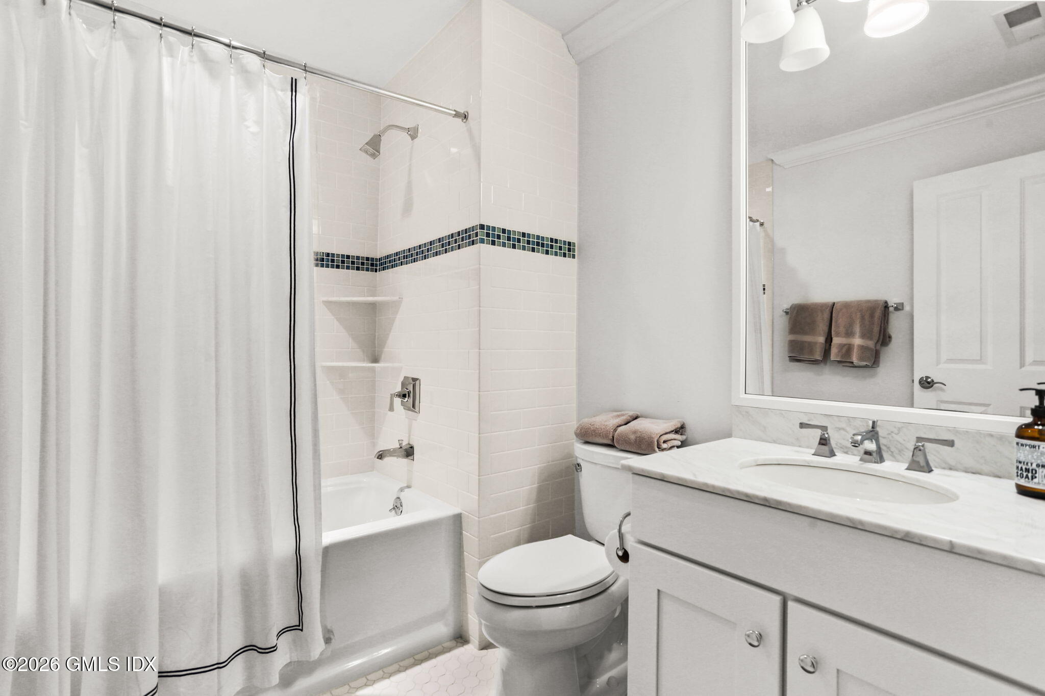 77 Havemeyer Lane, Unit 58 Stamford, CT 06902 - Photo 22 of 40 a bathroom with a granite countertop sink toilet and shower