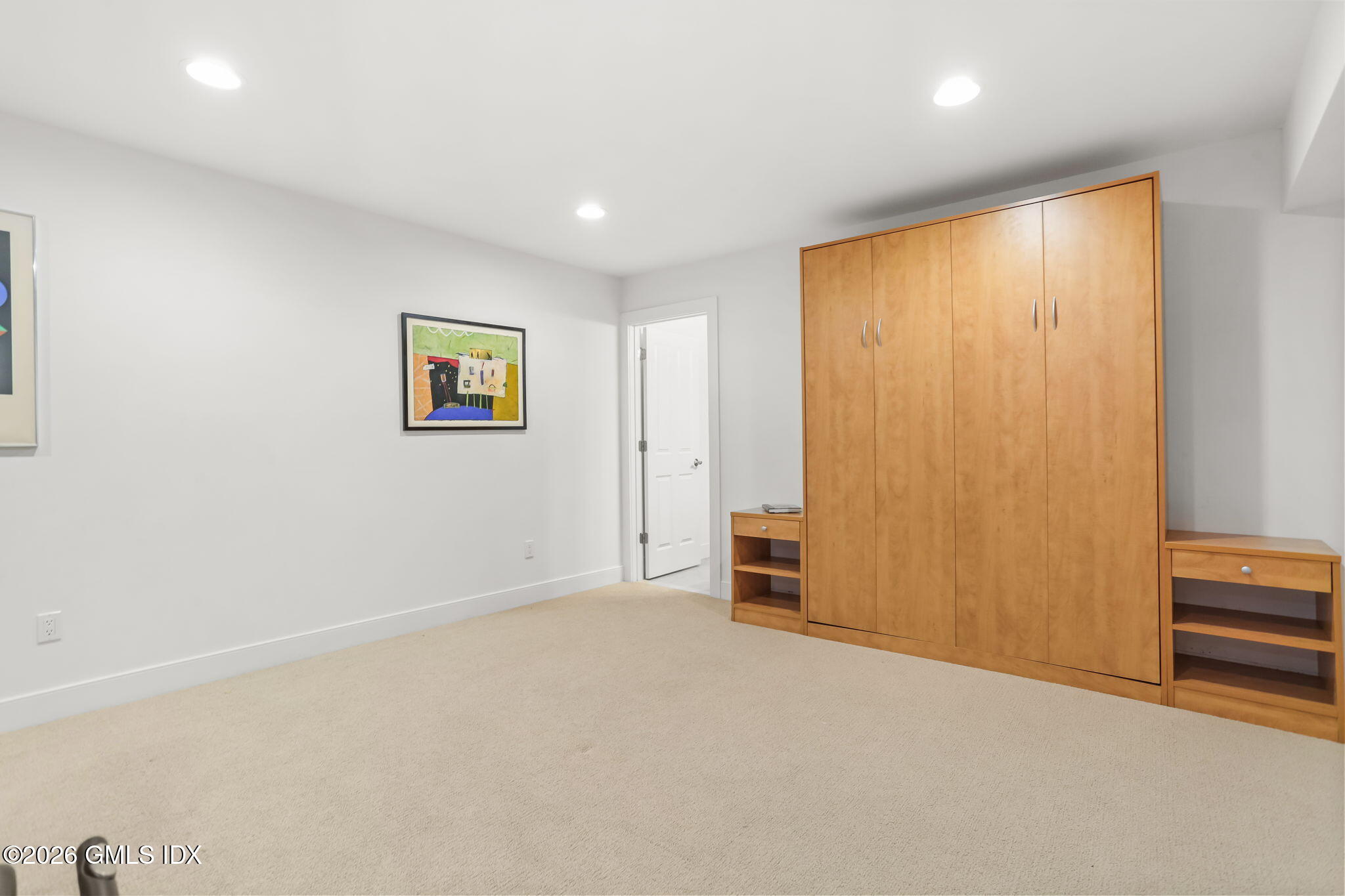 77 Havemeyer Lane, Unit 58 Stamford, CT 06902 - Photo 28 of 40 an empty room with a door