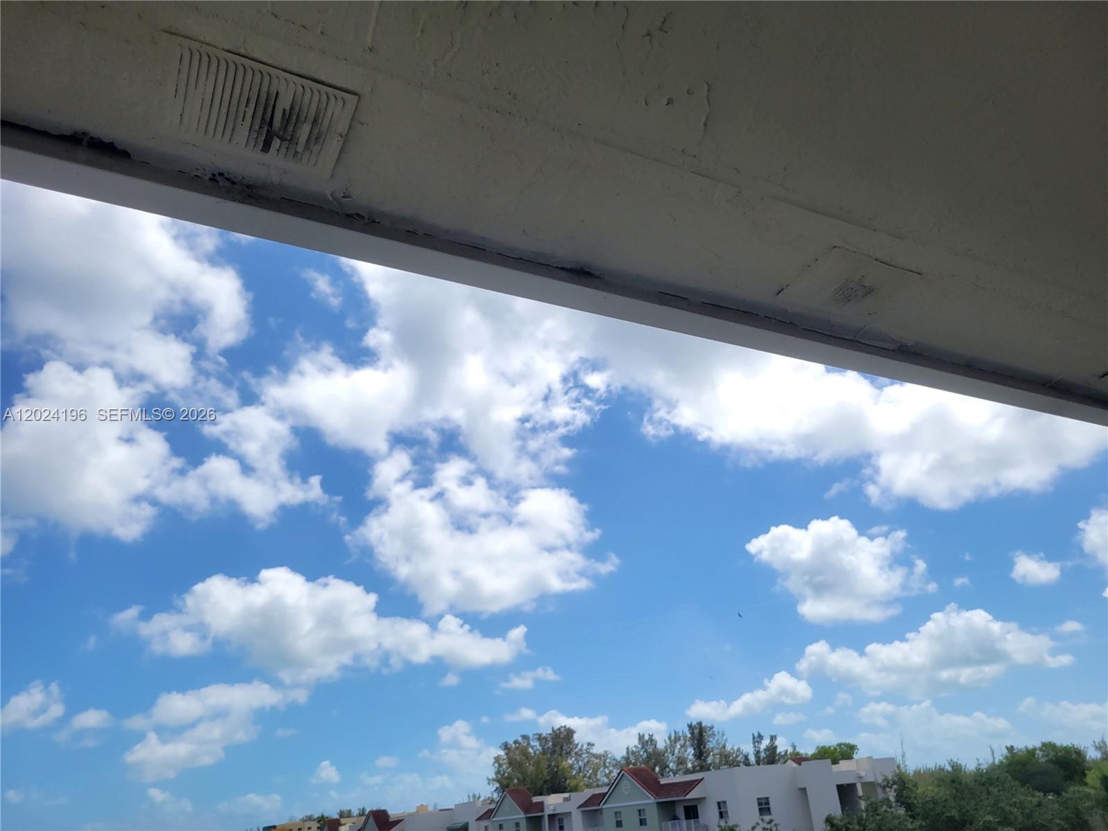 8260 Southwest 210th Street, Unit 319 Cutler Bay, FL 33189 - Photo 17 of 20 a view of a yard