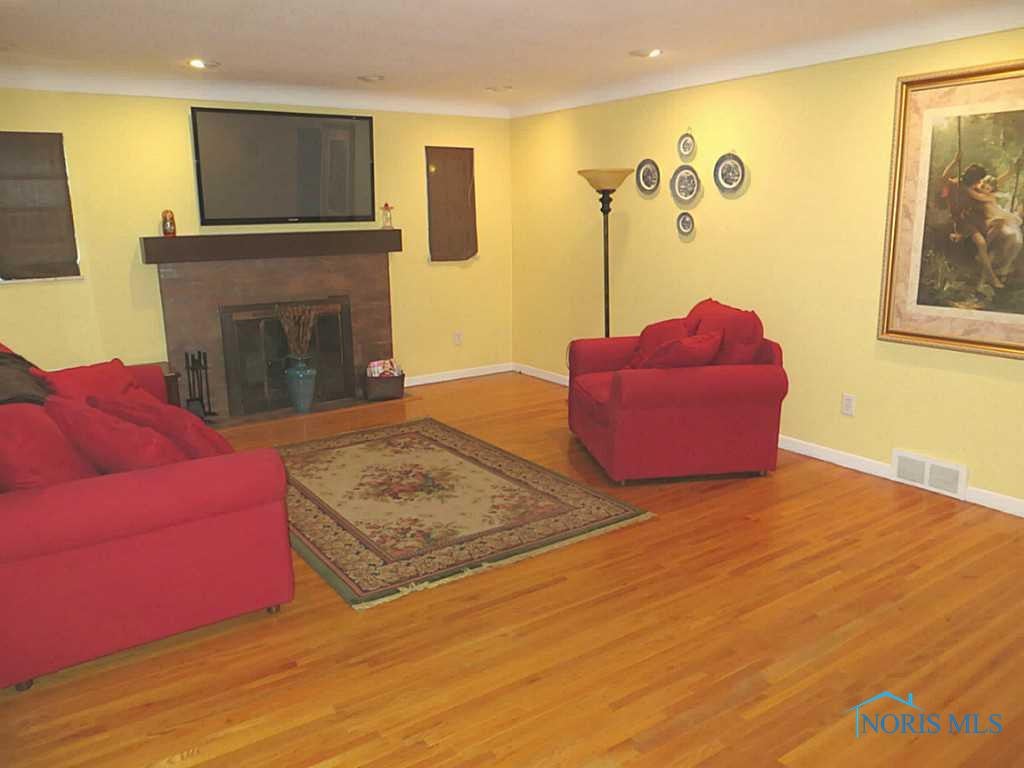 5873 Moline Martin Road Walbridge, OH 43465 - Photo 7 of 20 Family Room. The hardwood floors through the main floor are in amazing shape. So pretty!