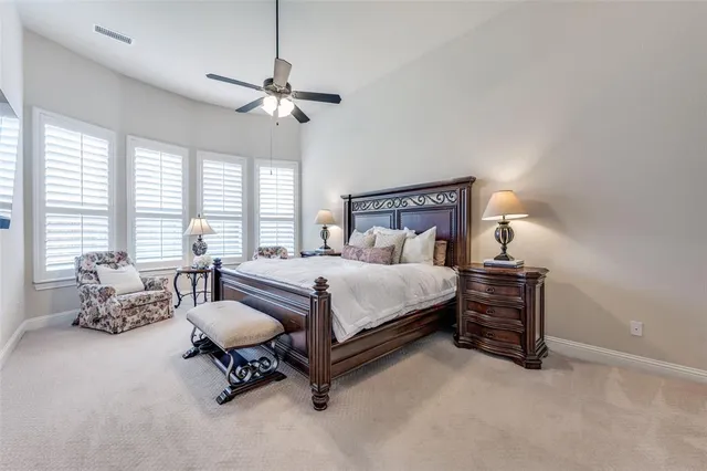 a bathroom with a toilet a sink and a mirror
