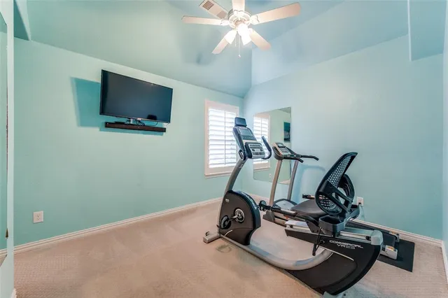 a white toilet sitting next to a bath tub