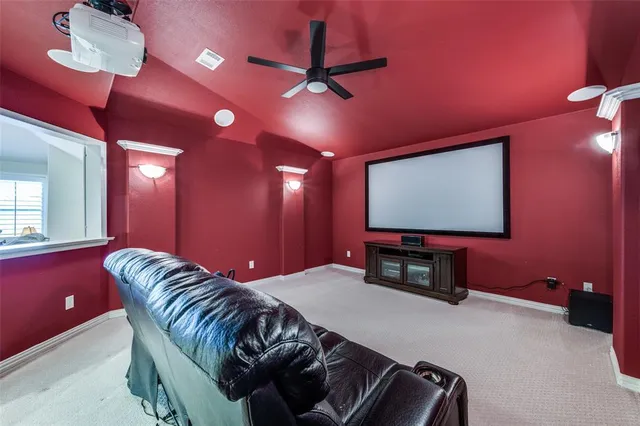 a view of room with window and furniture