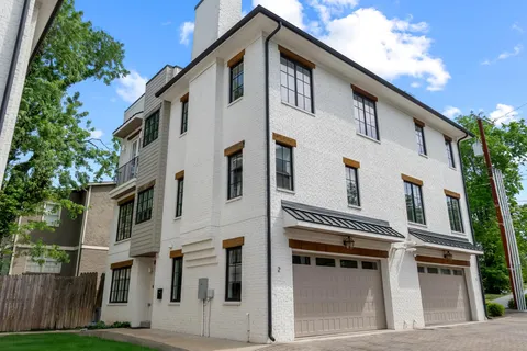 a large white building with a white roof