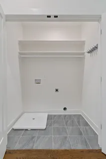 a view of a room with an empty space