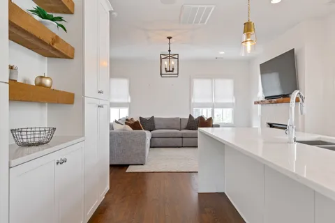 a living room with furniture and a window