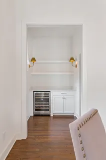 a view of an empty room and fire place